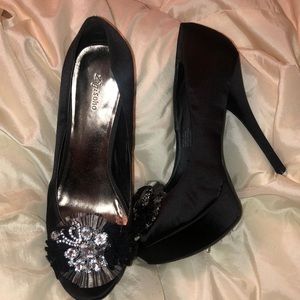 Black heels with embellished toe
